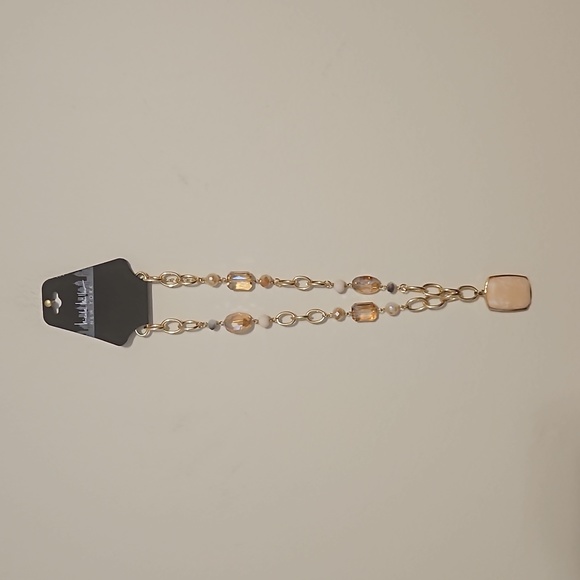 Nicole Miller Jewelry - Nicole Miller Pale pink and gold Square pendent Necklace